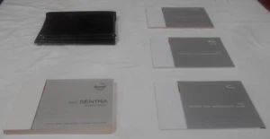 2007 NISSAN SENTRA OWNER MANUAL 5/PC.& BLACK NISSAN TRI-FOLD FACTORY CASE // - Picture 1 of 8