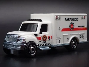 INTERNATIONAL TERRASTAR PARAMEDIC AMBULANCE EMS 1/64 MB SCALE DIECAST MODEL CAR - Picture 1 of 8