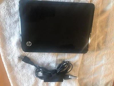 Mini portátil HP 110-3098NR y cargador - Imagen 1 de 4