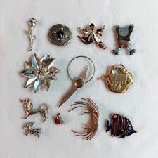 Lot of 12 brooches - most unbranded - clown, dogs, rose, Noah's Ark, fish, abstr