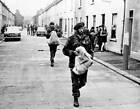 Men of 1st Battalion Welsh Guards carry a bag of gelignite the- 1972 Old Photo