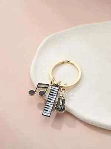 Portachiavi Unisex chitarra nota musicale ciondolo musicista dorato idea regalo - Foto 1 di 2