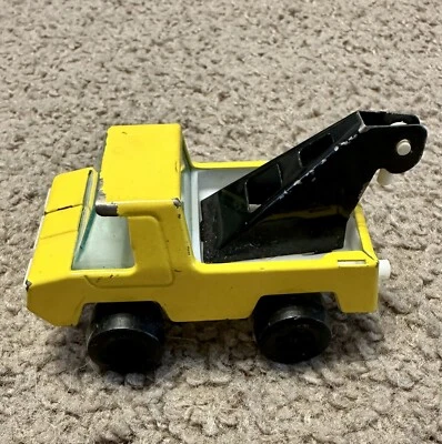 VINTAGE JAPAN PRESSED STEEL / TIN 2" TOW TRUCK Yellow - Image 1 of 4