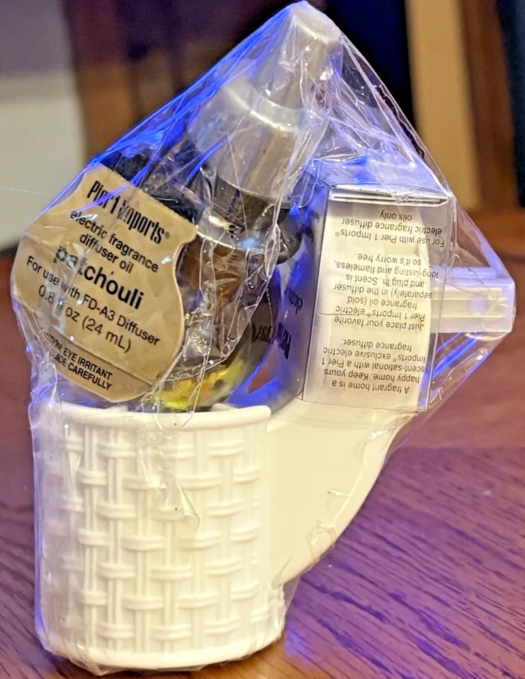 Pier 1 Imports Electric Fragrance Diffuser Patchouli Fragrance Oil Plug-In - Image 1 of 1