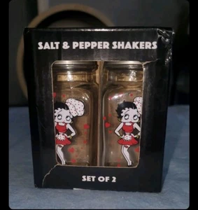 Juego de agitadores de sal y pimienta de vidrio Betty Boop nuevo en caja - Imagen 1 de 2