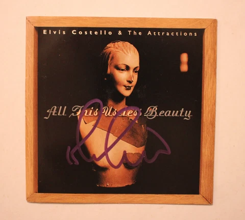 Autographed Hand Signed ELVIS COSTELLO CD Booklet "All This Useless Beauty" Cover