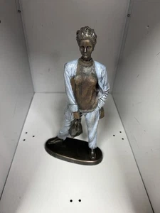 Bronze Effect Figurine Of Woman With Bag - Picture 1 of 7