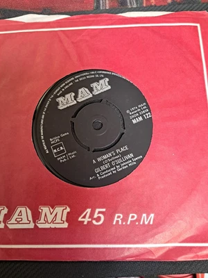 Gilbert O'Sullivan. A WOMAN'S PLACE / TOO BAD. 7" BRAND NEW UNPLAYED VINYL, SEE - Image 1 of 4