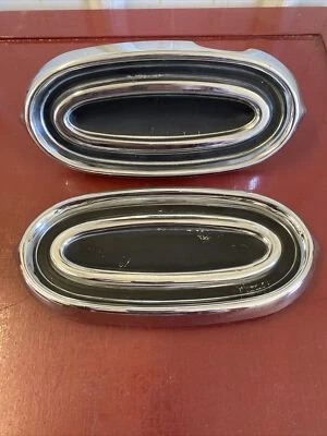 1958 58 PONTIAC CHIEFTAIN BONNEVILLE STAR CHIEF BACKUP LIGHT  DELETE COVERS PAIR - Image 1 of 4
