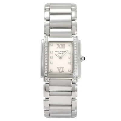 PATEK PHILIPPE Twenty 4 Twenty-4 bisel diamante 4910/10A-011 esfera blanca  Foto 1 de 4