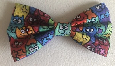 Pajarita adorable hecha a mano para perros gatos coloridos con elástico ideal para personas también Foto 1 de 4
