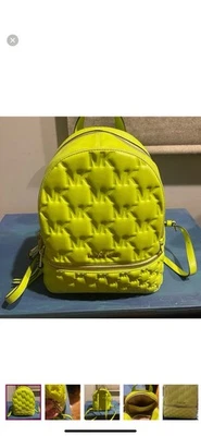 Mochila Michael Kors Rhea acolchada con adornos de cuero verde neón rara Foto 1 de 4