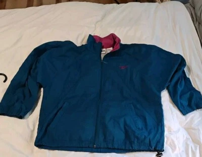 Chaqueta cortavientos Reebok vintage para mujer talla mediana cremallera completa azul púrpura Foto 1 de 4
