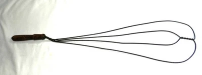 Vintage 29-inch Rug Beater w/ Classic Pattern & Offset Distressed Wood Handle - Image 1 of 3