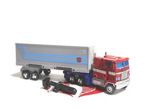 Figura de acción Transformers Earth Rise Optimus Prime con remolque incompleto - Imagen 1 de 4