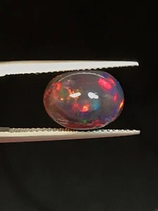 3,21 kt Multi Color Play natürlicher schwarzer Opal oval Cab loser Edelstein - Bild 1 von 5