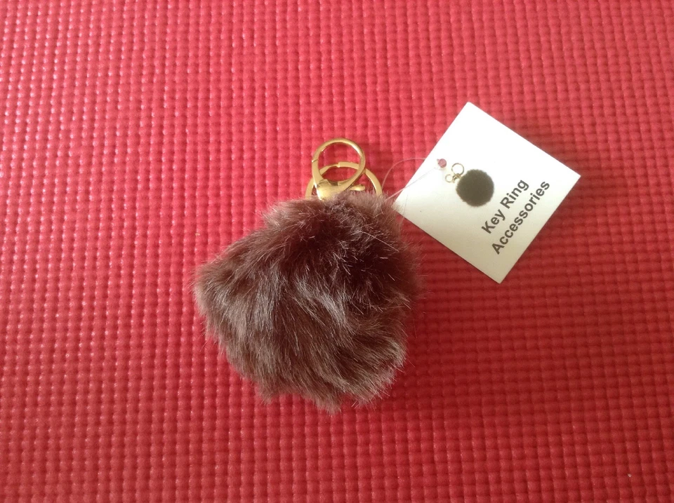 Chaveiro de mão de pele sintética Pom Pom - Imagem 1 de 1