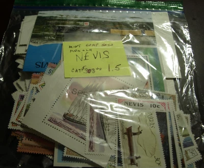 SELLOS DE NEVIS DE 1,5 ONZAS COMO NUEVOS CONJUNTOS EN SU MAYORÍA COMPLETOS VALOR GATO $303,00+ Foto 1 de 2