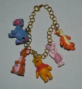 Pre-loved Disney Winnie the Pooh child's gold-tone charm bracelet - Picture 1 of 2
