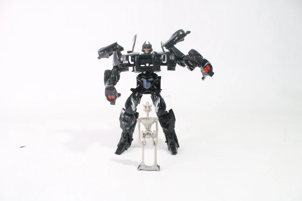Transformers: Movie Deluxe Wave 1 Barricade w/ Frenzy  ( Hasbro, 07) - Image 1 of 4