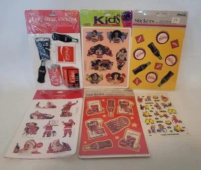 Lot of 6 Vintage Coca-Cola Stickers, 4  Sealed, 1 Puffy Open, 1 Transfer Sheet  - Image 1 of 4