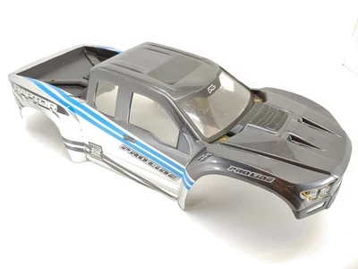 CRACKS: Silver/Gray Proline Ford Raptor Painted Body for Traxxas X-Maxx - Image 1 of 4