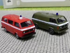 1/87 Roco VW T3 Army Millitär Police Bus + VW T3 Kasten 814 - Bild 1 von 2