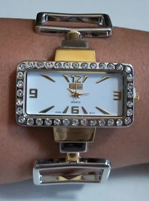 Reloj brazalete para mujer con acabado plateado/dorado estrás de moda elegante/de uso casual  Foto 1 de 4