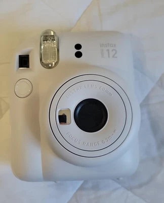 Caja abierta - Cámara instantánea Fujifilm Instax Mini 12 blanca Foto 1 de 2