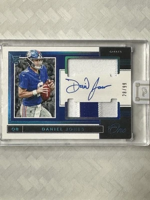 2019 Panini One - Rookie Dual Patch Auto Daniel Jones #39 Blue /99 (AU, MEM, RC) - Image 1 of 3
