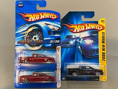 Nissan Titan 2006 tarjeta azul #031 Hot Wheels nuevos modelos rojo negro Foto 1 de 4