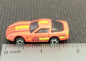 Hot Wheels Corvette 1982 Orange w/ Yellow/Brown Stripe - Picture 1 of 6