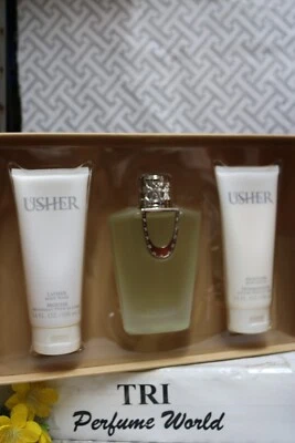 USHER 3 piezas. Set Eau de Parfum 3,4 oz. + Loción corporal 3,4 oz. + Gel de ducha 3,4 oz Foto 1 de 2