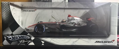 F1 Hot wheels Formula 1 McLaren MP4-21 Kimi Raikkonen - die cast 1:18  NIB - Image 1 of 4