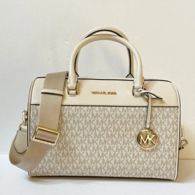 Bolso de viaje mediano Michael Kors MK Jet Set en crema claro Foto 1 de 4