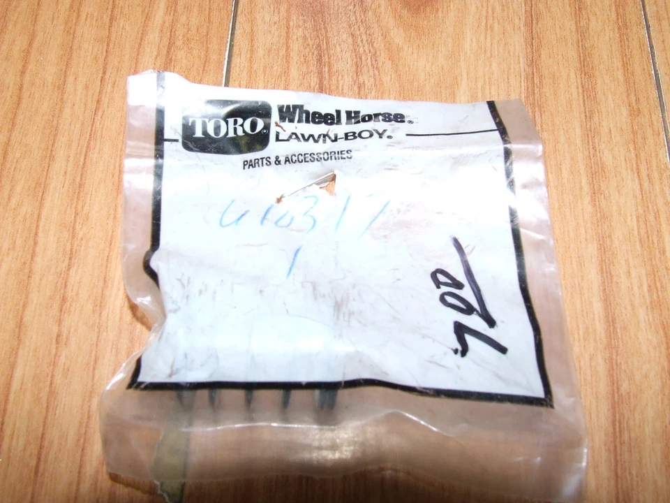 GENUINE TORO/ LAWN BOY String Trimmer Inner Reel Spring - 610317 NOS Lawn-Boy - Image 1 of 1