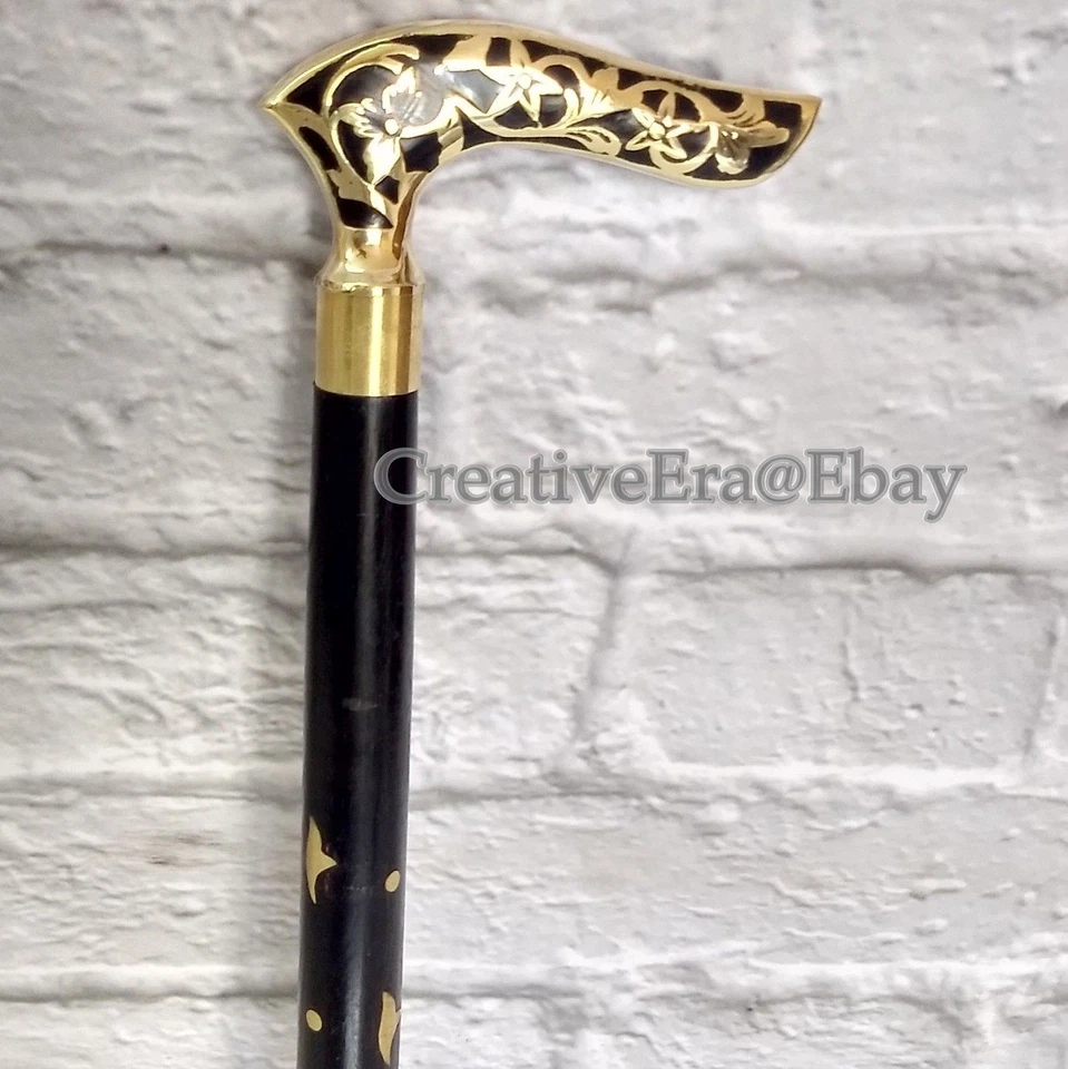 Bastón de diseño con mango de cabeza de resina de latón negro con incrustaciones de latón  Foto 1 de 4