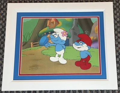 PRODUCCIÓN PITUFOS ANIMACIÓN CEL OF PAPA & TOCADOR PITUFO CON SELLO ENMARCADO CERTIFICADO DE AUTENTICIDAD Foto 1 de 3