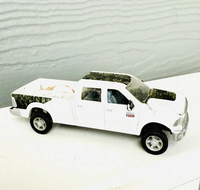 ERTL 1/64 (Realtree Camo Edition) White DODGE RAM 2500 Pickup Truck 4” Length - Image 1 of 4