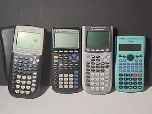 Lot of 4 Non Working Graphing Calculators - For Parts Or Repair Only - Picture 1 of 8