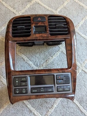 Fabricante de equipos originales Hyundai Sonata 2002-2005 grano de madera control de clima ventilación de aire HVAC bisel embellecedor Foto 1 de 4