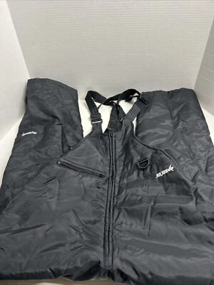 Pantalones de nieve Skigear babero grandes juveniles negros en general 1/4 cremallera nailon Foto 1 de 4