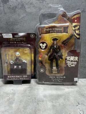 LOTE DE 2 FIGURAS DE PARQUES DE DISNEY PIRATAS DEL CARIBE DONALD WILL TURNER CISNE Foto 1 de 4