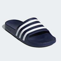 white and blue adidas slides