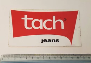 Adesivo / Sticker / Adhesif ( anni 80 ) TACH Jeans - Picture 1 of 1