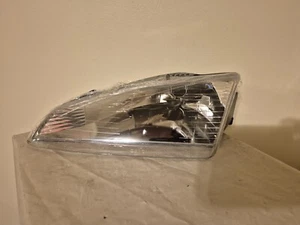 Headlight Assembly 1993 to 1994 Dodge Intrepid Driver Left Side w/Bulb - Picture 1 of 4