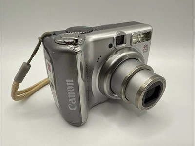 Canon Powershot A560 7.1MP Compact Digital Camera Silver + 4GB SD Card - Working - Image 1 of 4