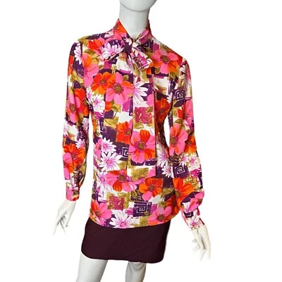 Blusa mediana vintage de los años 60/70 con lazo floral Foto 1 de 4