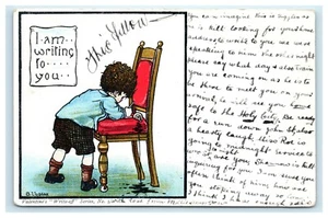 POSTKARTE Kind schreibt auf Stuhl verschüttete Tinte Ich schreibe dir  - Bild 1 von 2