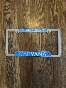 Auténtico marco de matrícula de metal Carvana "WE'LL DRIVE YOU HAPPY" - Imagen 1 de 2